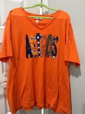 Bella Canvas Orange V-Neck Tee with Mixed-Pattern ASTROS Appliqué